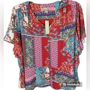 Women’s Chico blouse size 3 US size 16.flutter style sleeve. Patchwork print.